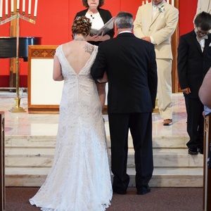 size 6 wedding dress. wore for ceremony and pictures.